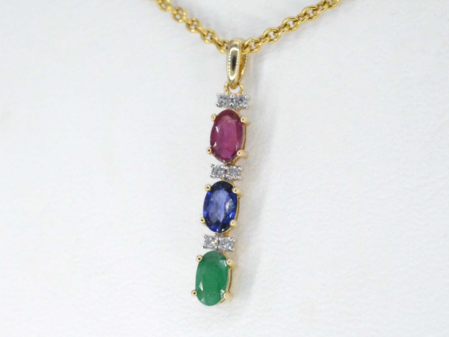 Gouden hanger met multicolour edelstenen en diamant