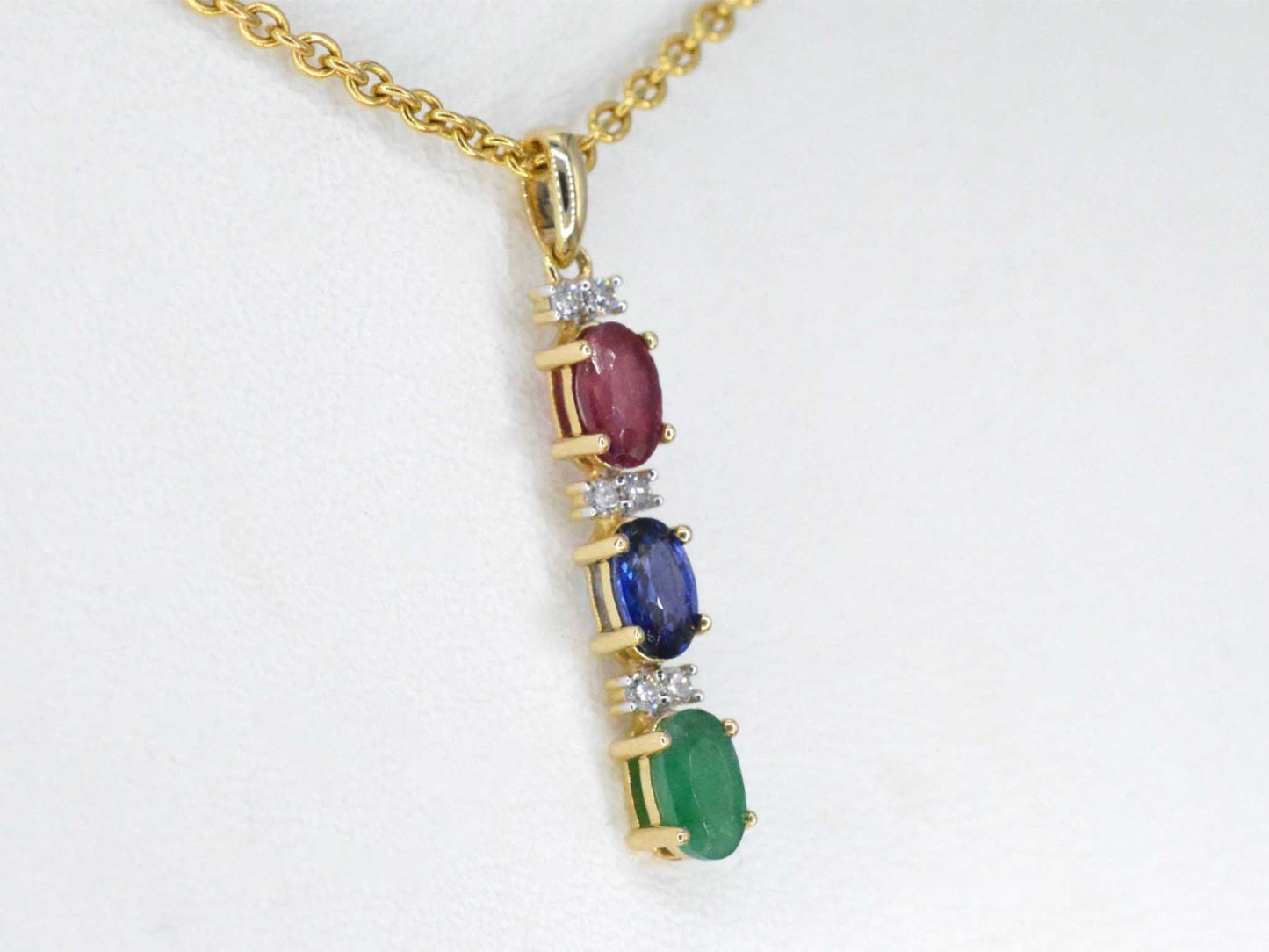 Gouden hanger met multicolour edelstenen en diamant