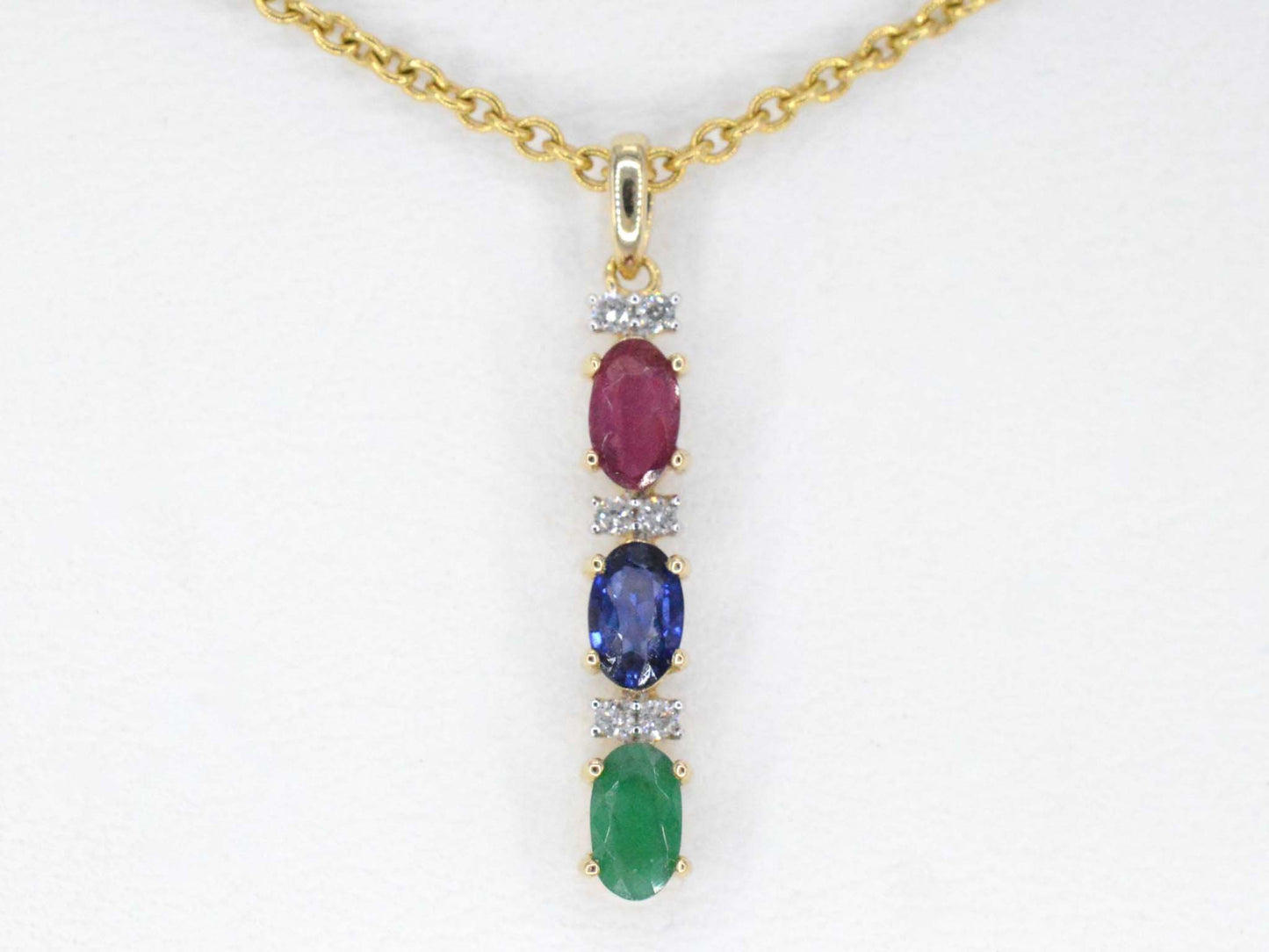 Gouden hanger met multicolour edelstenen en diamant