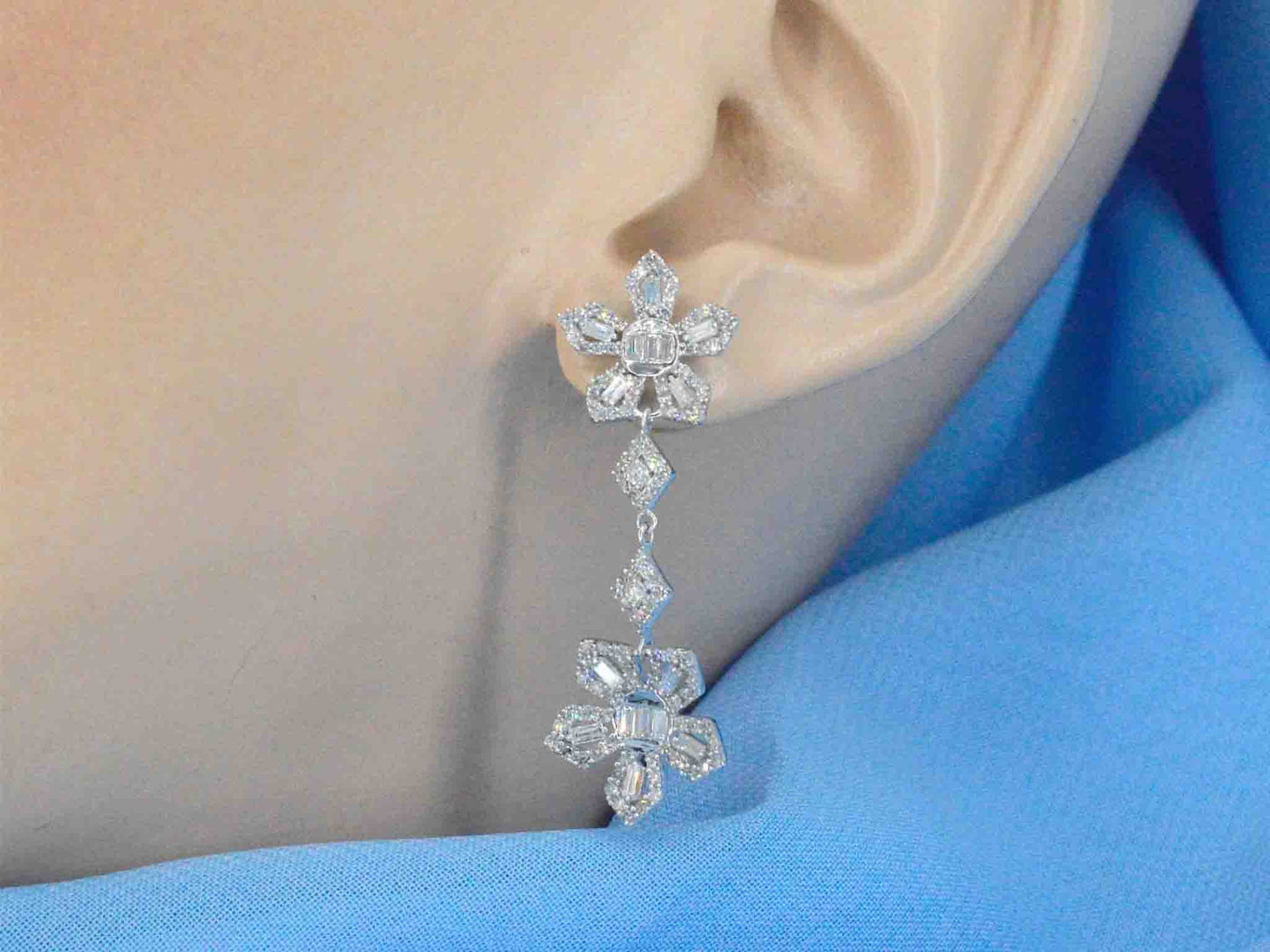 Witgouden oorbellen met 1.50 carat diamanten