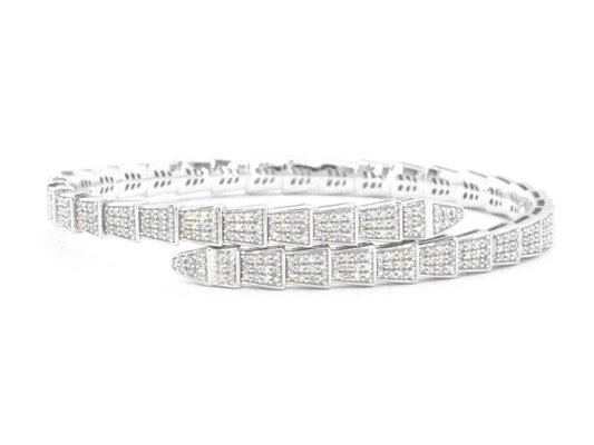 Witgouden armband van slangen model met natuurlijke diamanten