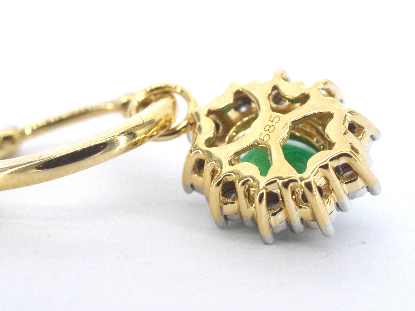 Gouden oorhangers met natuurlijke diamanten en smaragden