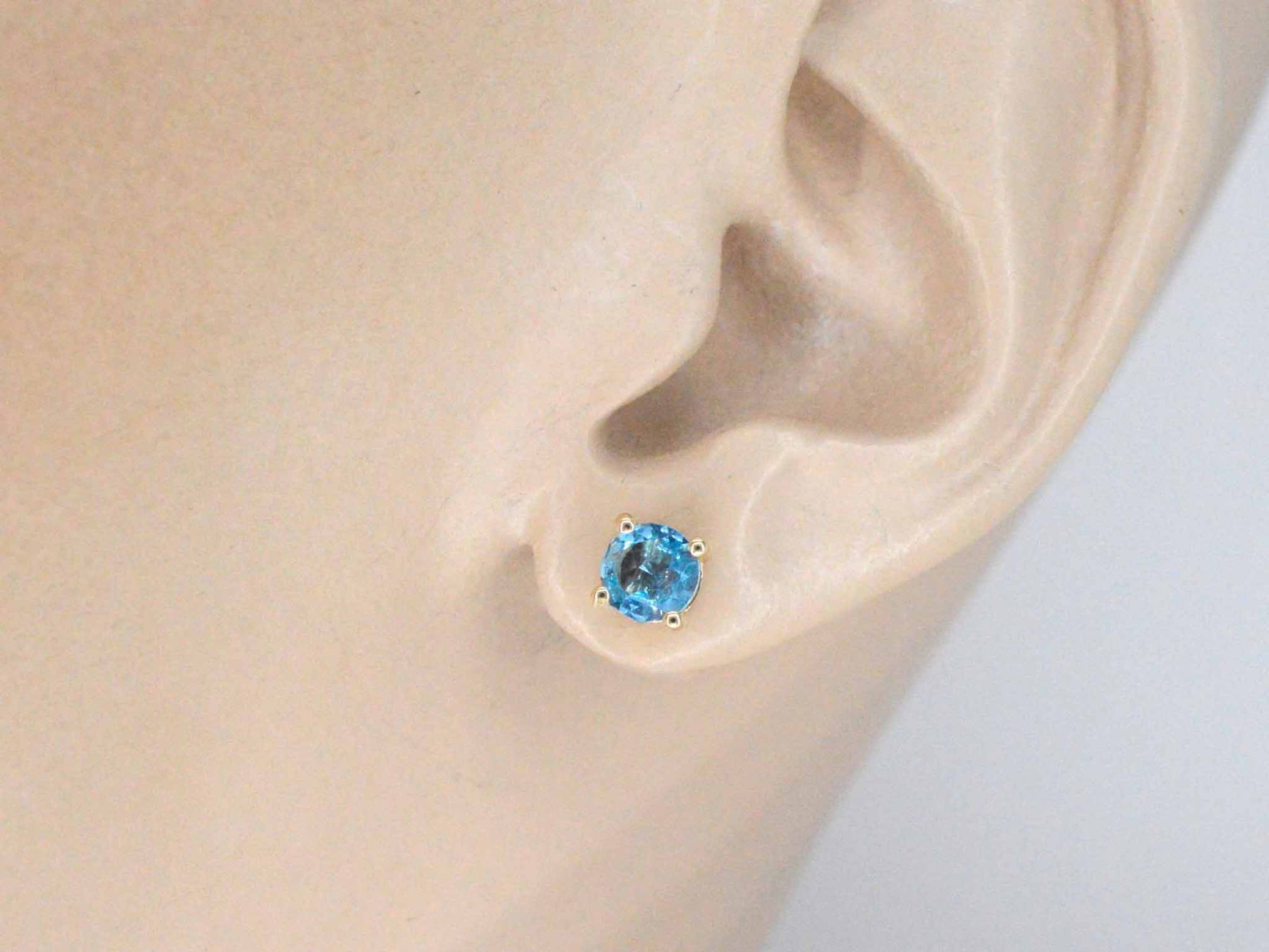 Gouden oorbellen met topaas