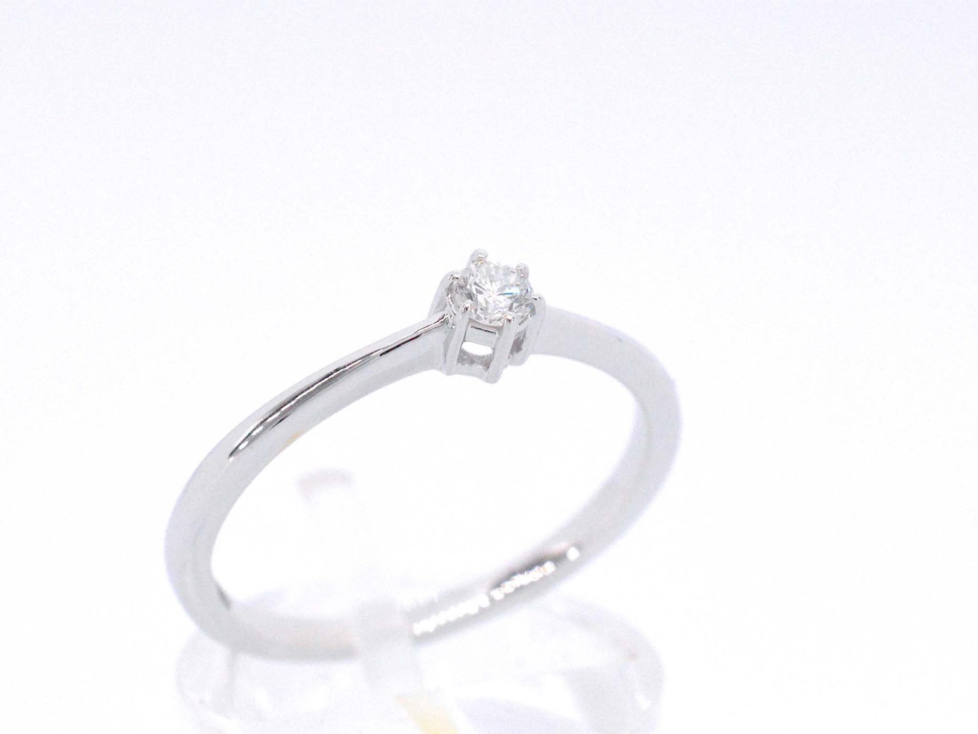 Witgouden ring solitaire met een briljant geslepen diamant 2502-2