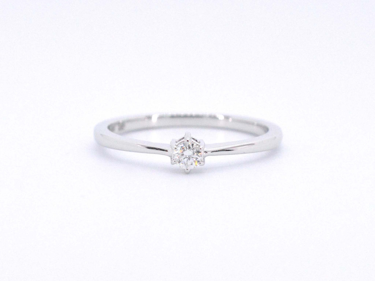 Witgouden ring solitaire met een briljant geslepen diamant 2502-4