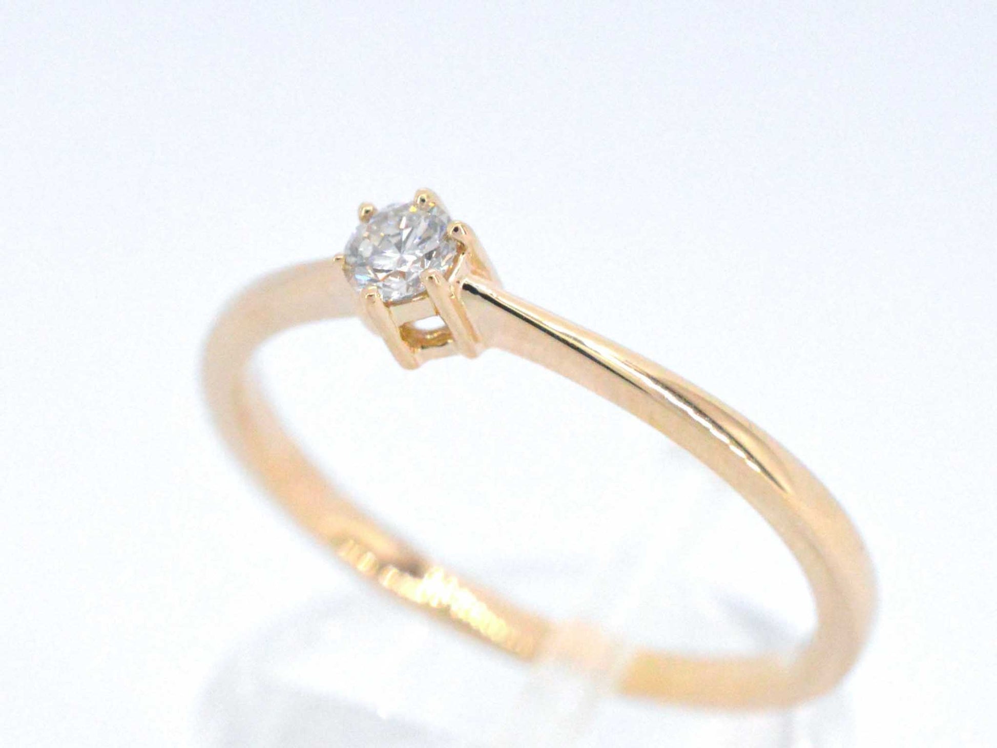 Gouden ring solitaire met een briljant geslepen diamant 2503-1