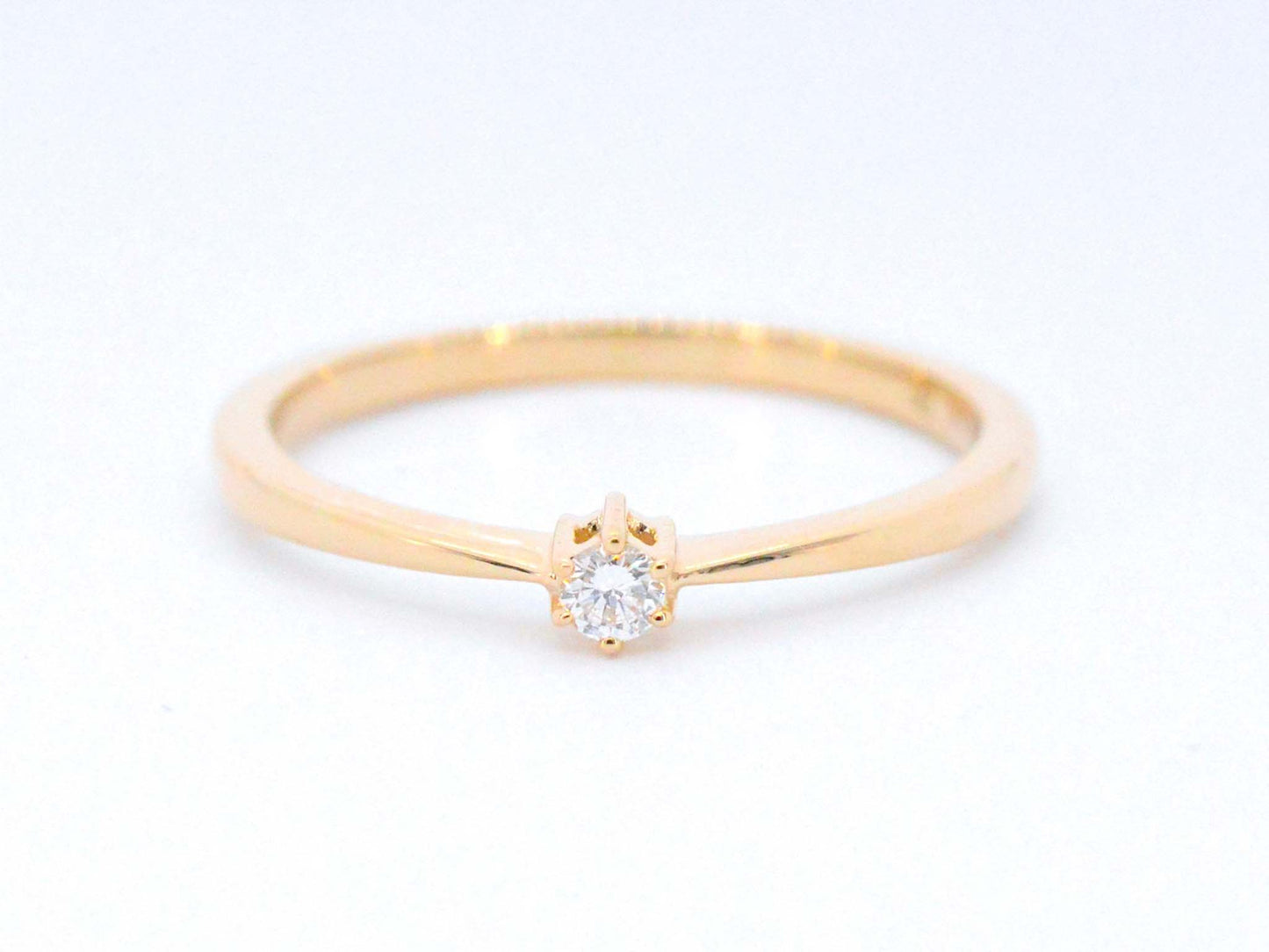 Gouden ring solitaire met een briljant geslepen diamant 2504-4