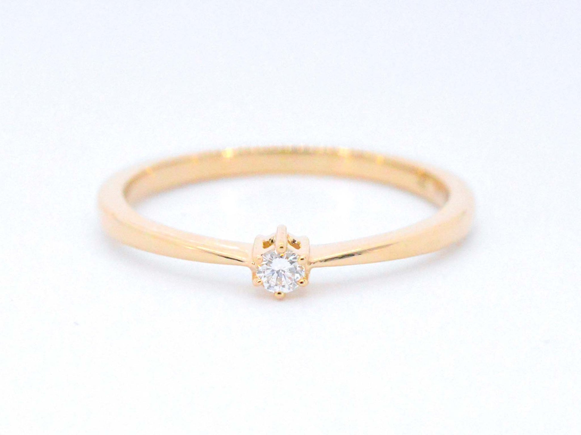 Gouden ring solitaire met een briljant geslepen diamant 2504-4
