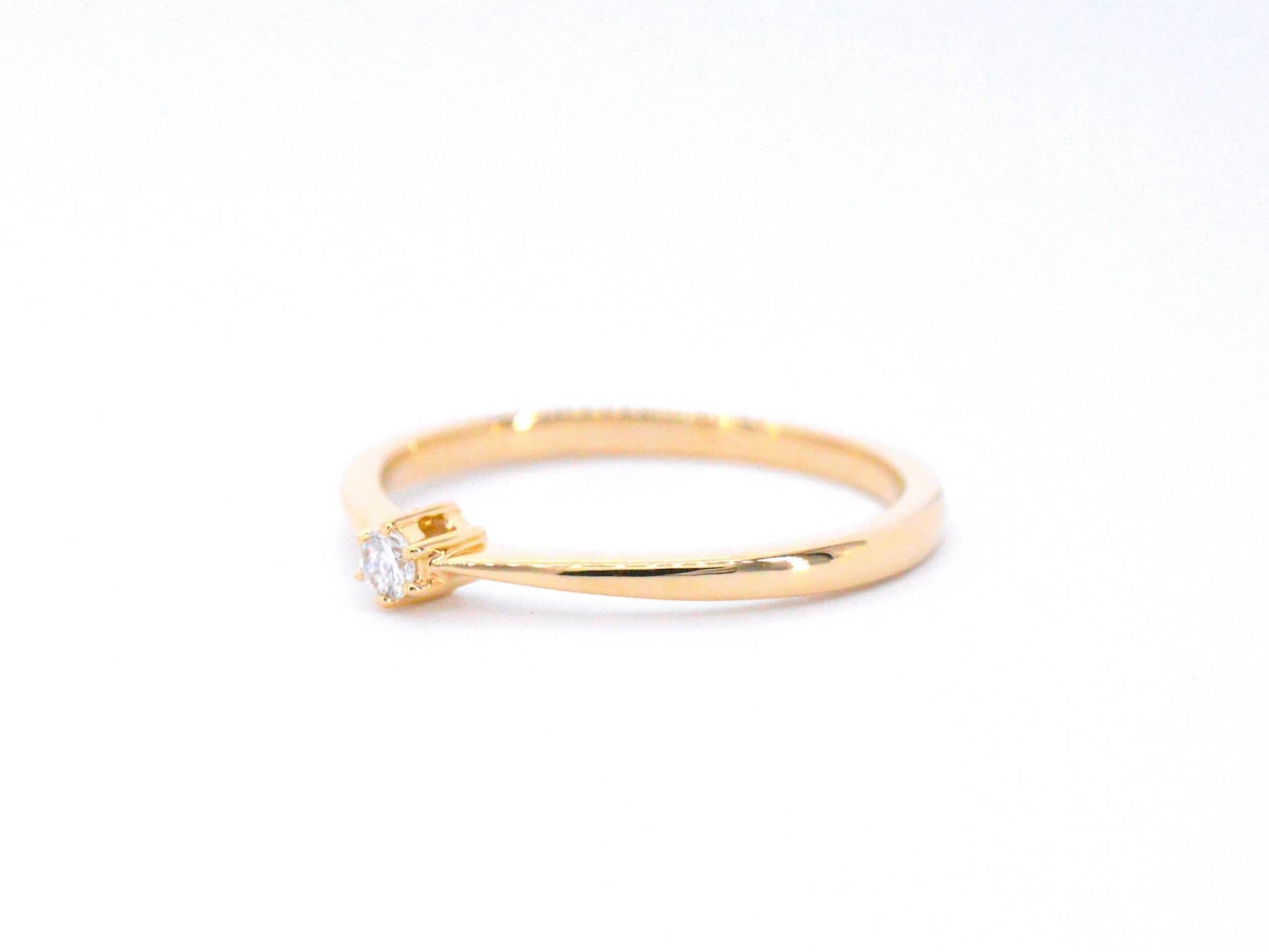 Gouden ring solitaire met een briljant geslepen diamant 2504-6