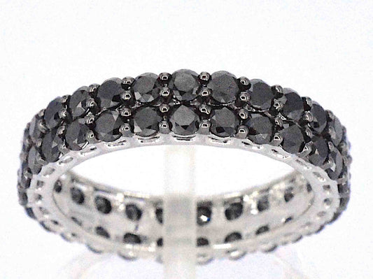Witgouden eternity ring met zwarte diamanten