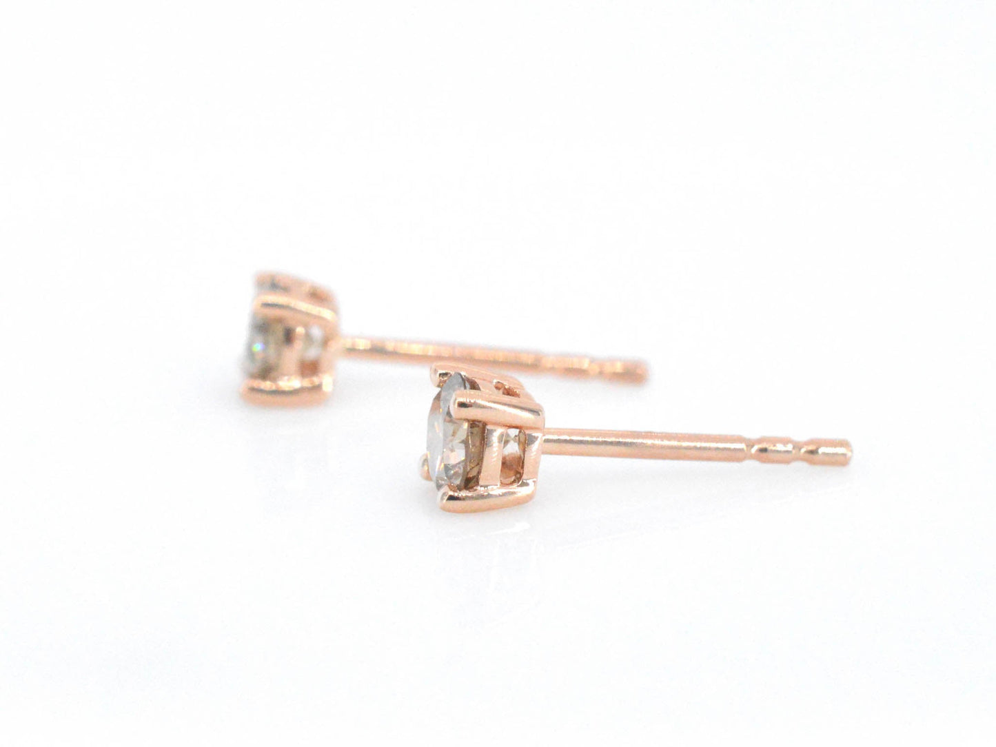 Rosegouden solitair oorbellen met cognac diamanten