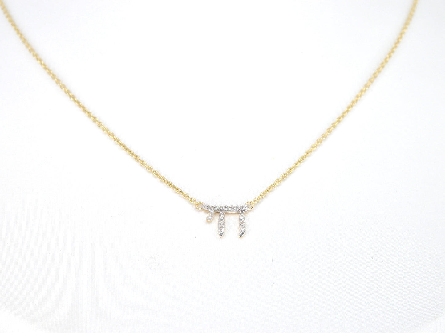 Gouden halsketting met diamanten 'chai'