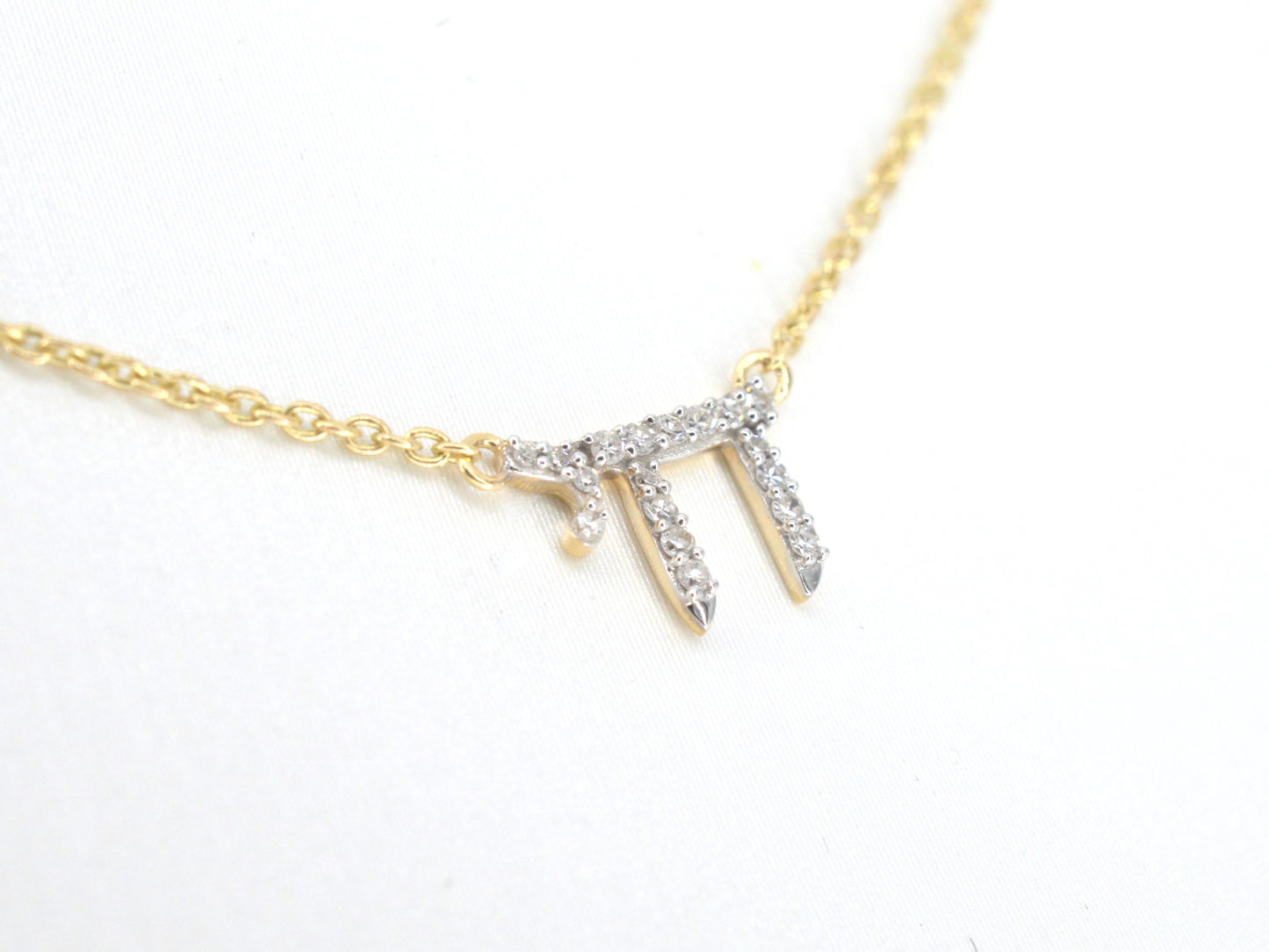 Gouden halsketting met diamanten 'chai'