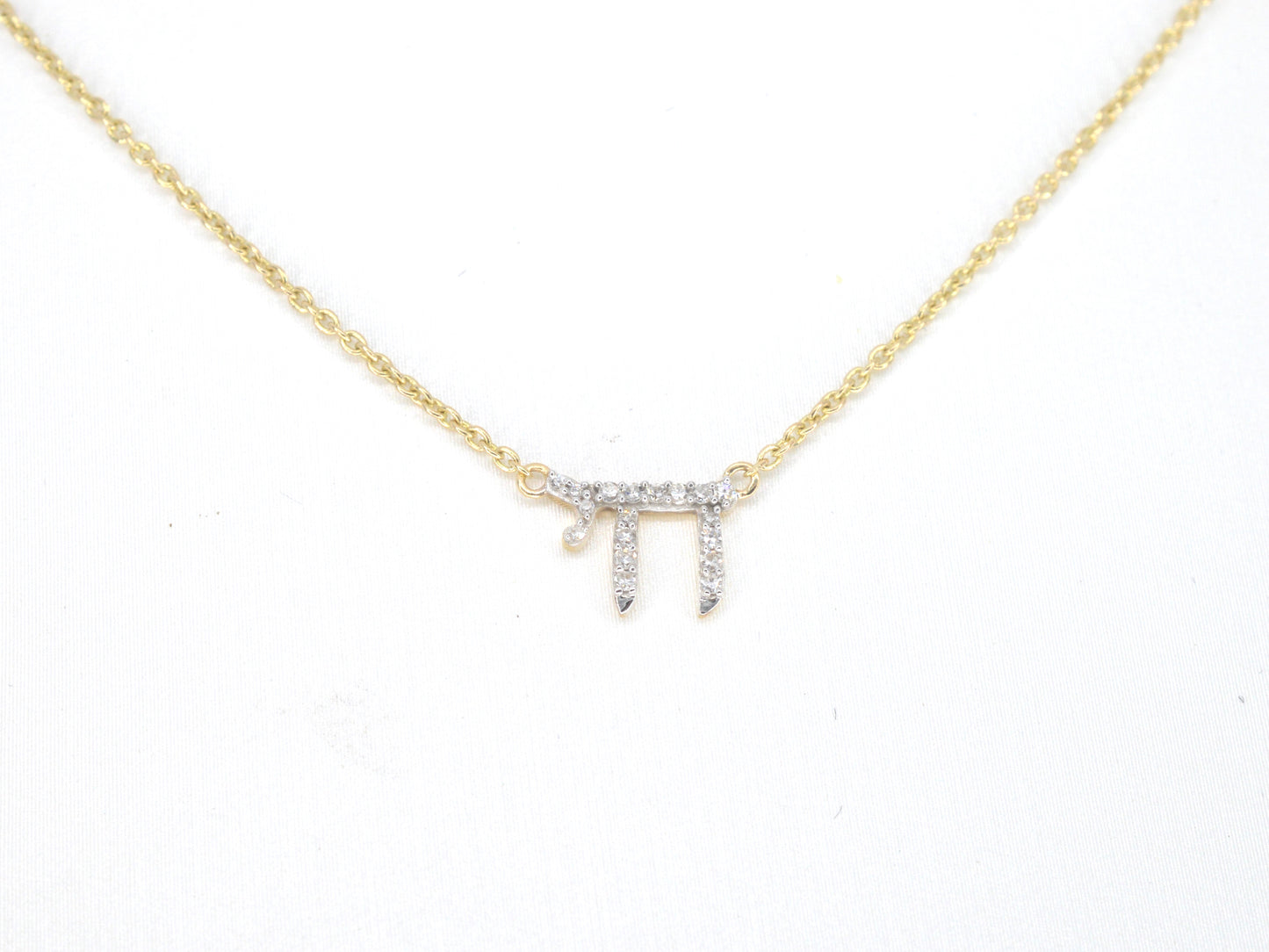 Gouden halsketting met diamanten 'chai'