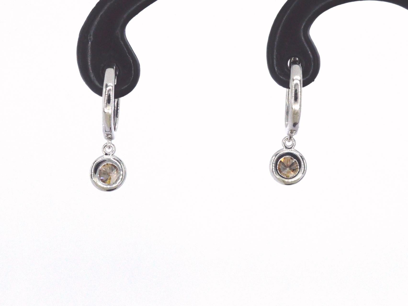 Witgouden oorbellen met natuurlijke diamanten 2721-2