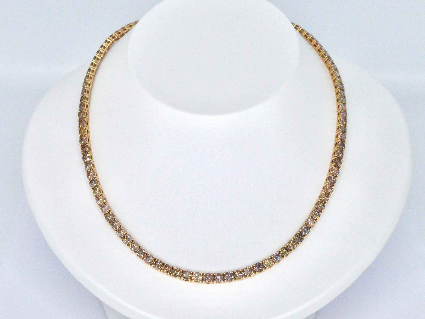 Geelgouden exclusieve tennis collier met champagne en cognac diamanten