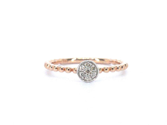 Rosegouden ring met centraal een rondje vol gezet met diamanten