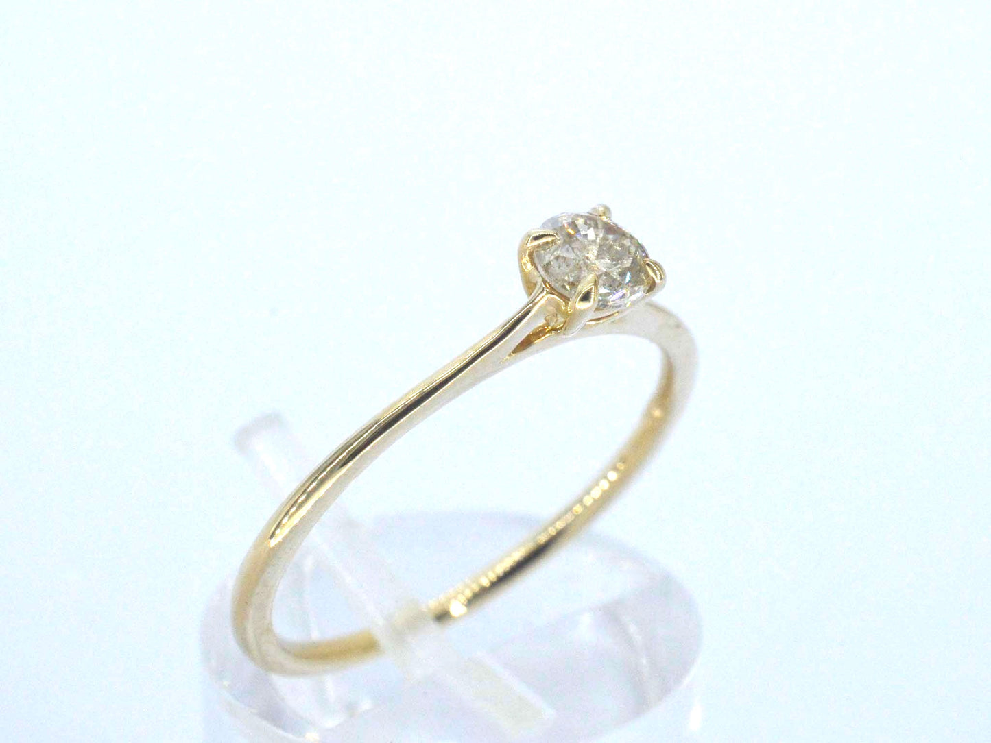 Gouden ring solitair met natuurlijke briljant geslepen diamanten