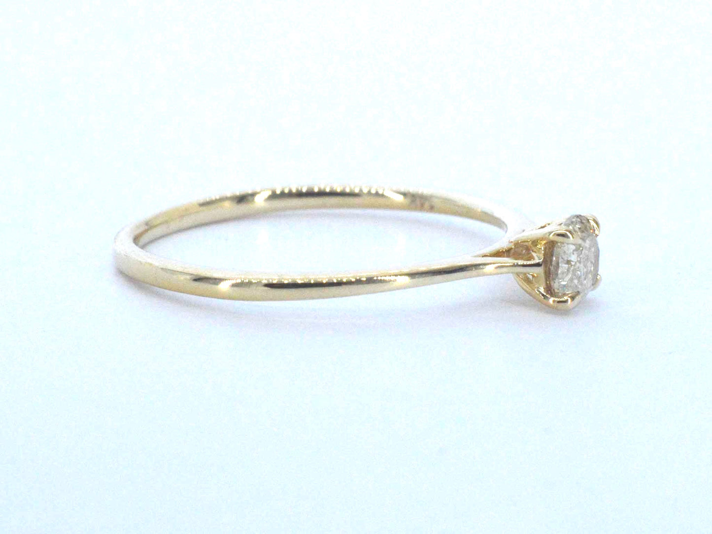 Gouden ring solitair met natuurlijke briljant geslepen diamanten