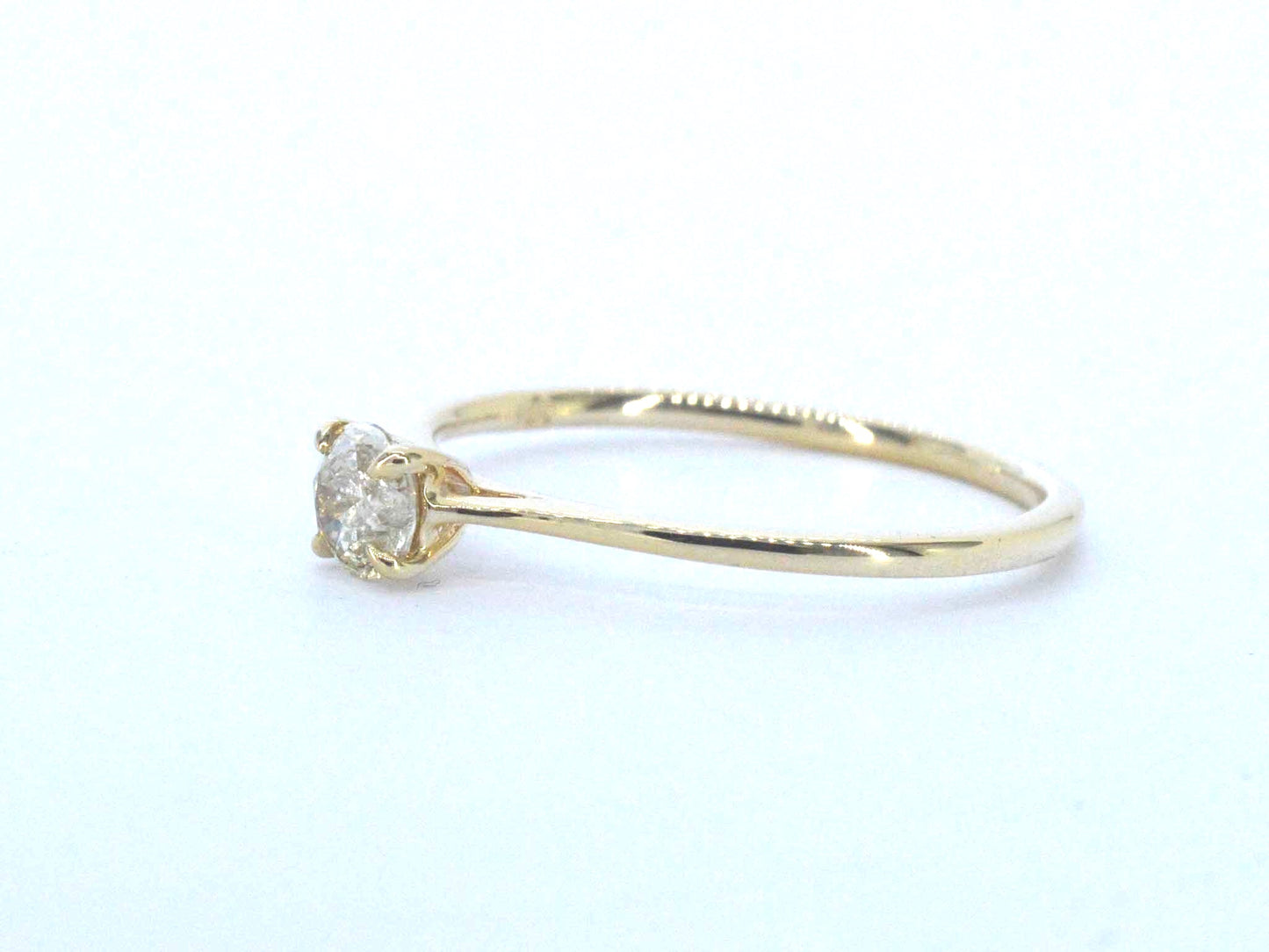 Gouden ring solitair met natuurlijke briljant geslepen diamanten