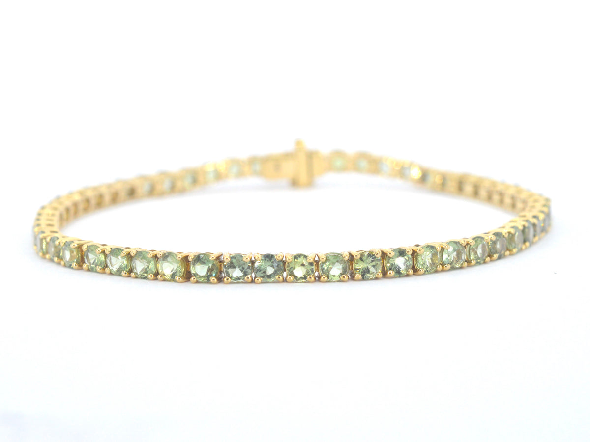 Gouden tennisarmband met natuurlijke saffieren