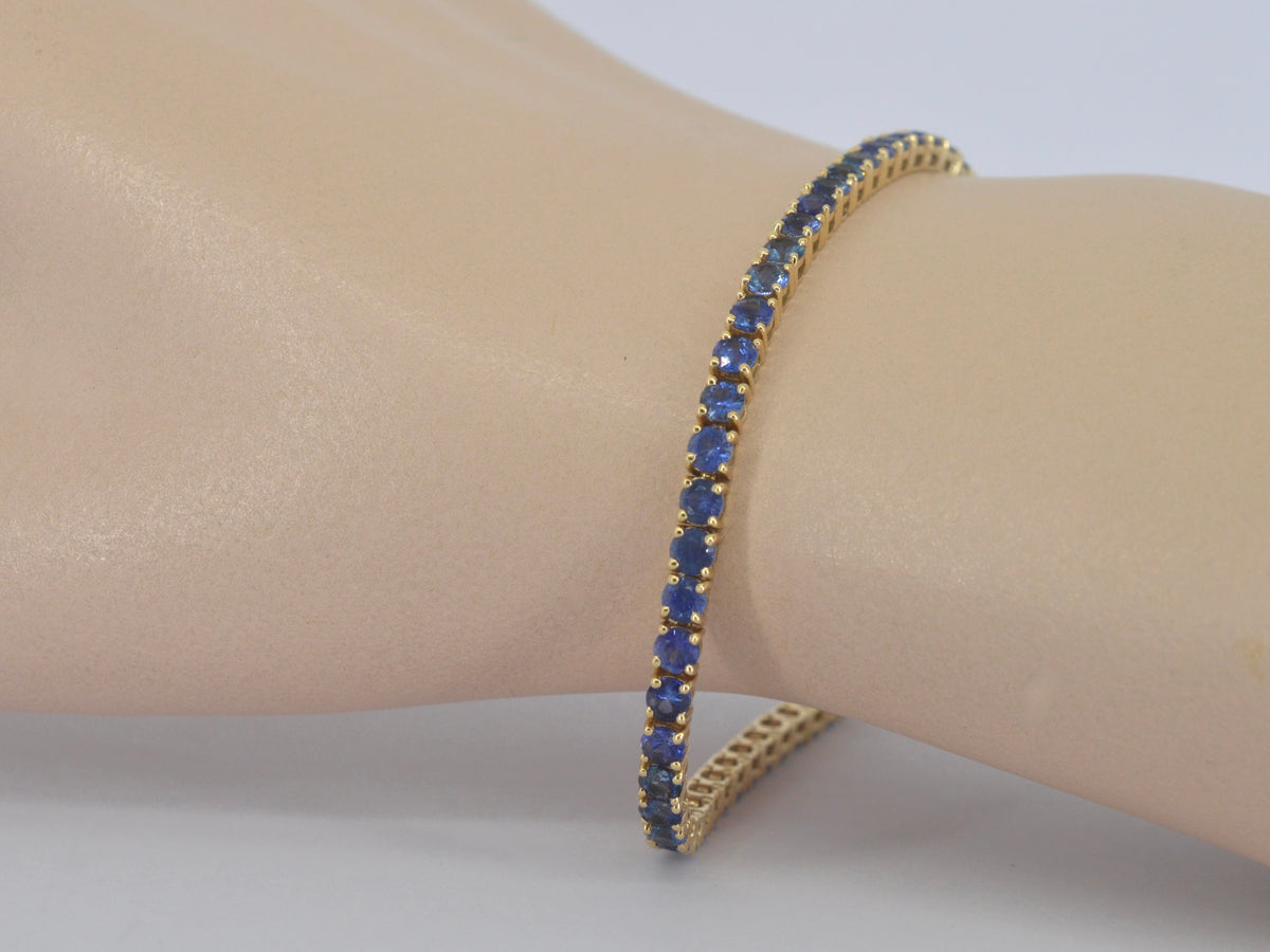 Gouden tennisarmband met natuurlijke saffieren