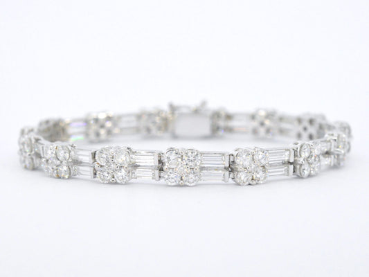 Gouden armband met briljant en baguette geslepen diamanten