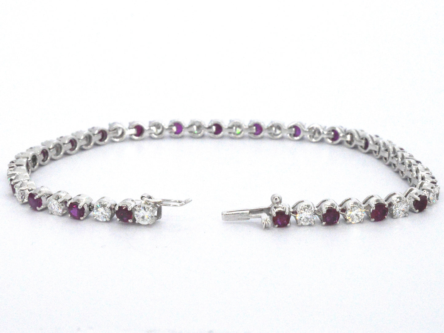 Gouden 18 karaat tennisarmband met hoge kwaliteit natuurlijke diamanten en robijnen