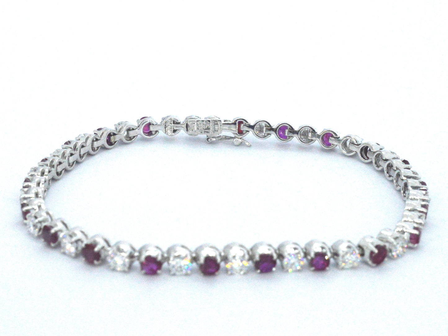 Gouden 18 karaat tennisarmband met hoge kwaliteit natuurlijke diamanten en robijnen