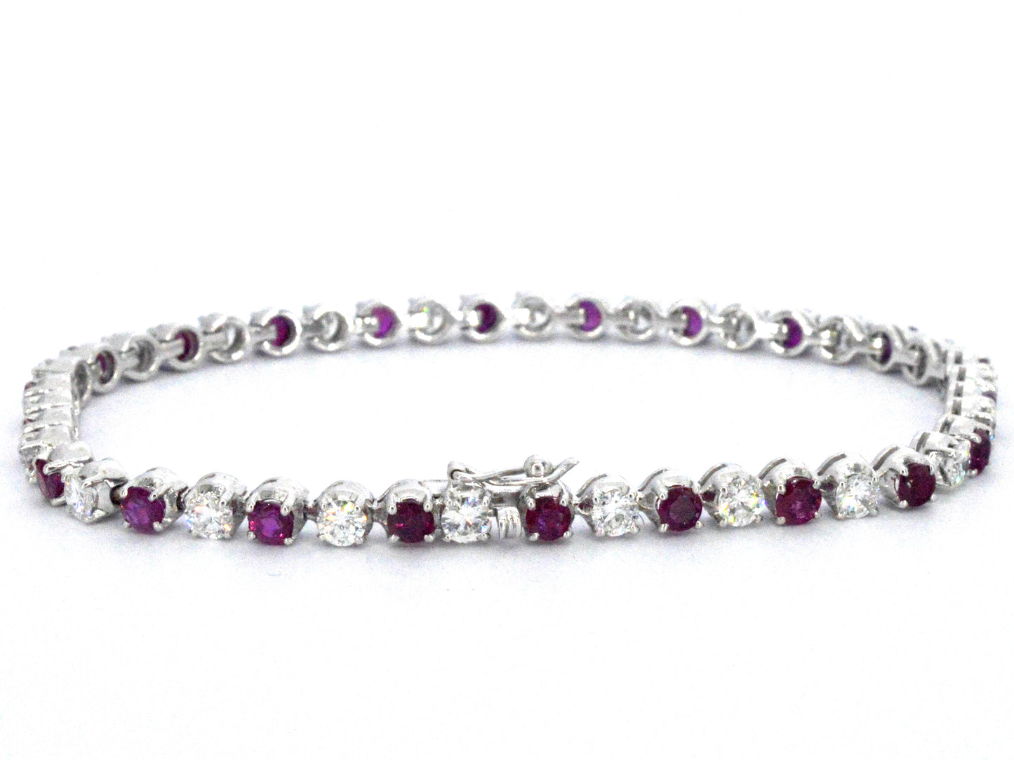 Gouden 18 karaat tennisarmband met hoge kwaliteit natuurlijke diamanten en robijnen