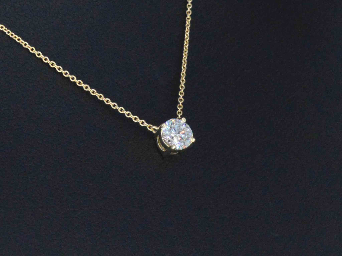 Gouden halsketting met een Briljant geslepen diamant van 0.50 carat