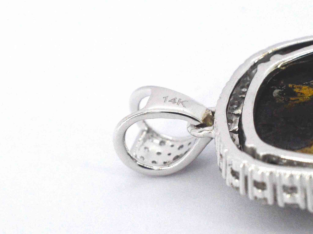 Witgouden hanger met witte en zwarte diamanten
