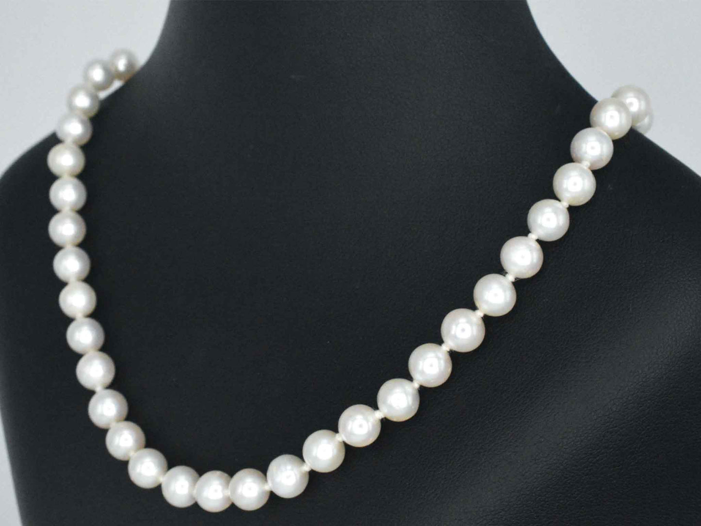 Parelsnoer met gouden sluiting met diamant