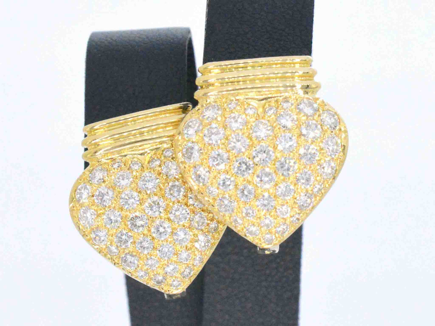 Gouden hart oorbellen met diamant