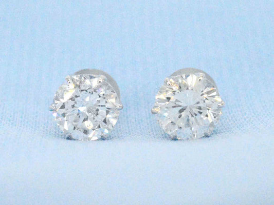 Platina solitair oorbellen met natuurlijke briljant geslepen diamanten