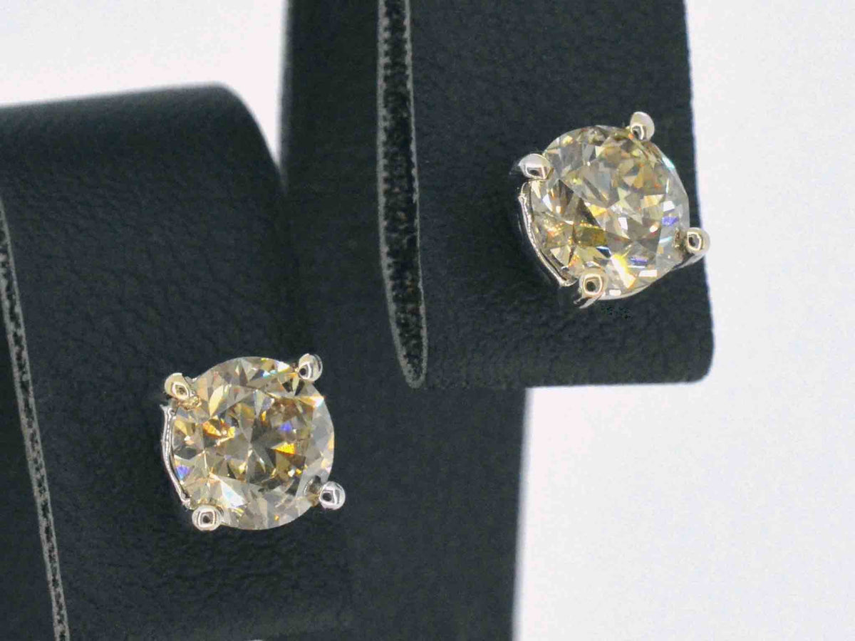 Witgouden solitair oorbellen met champagne diamant 3.00 carat