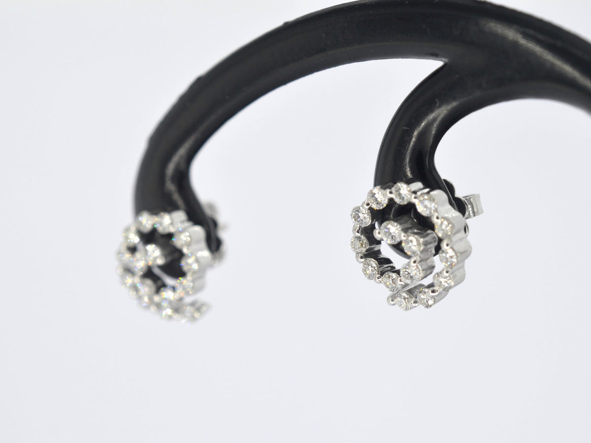 Witgouden oorbellen met diamanten in spiraal