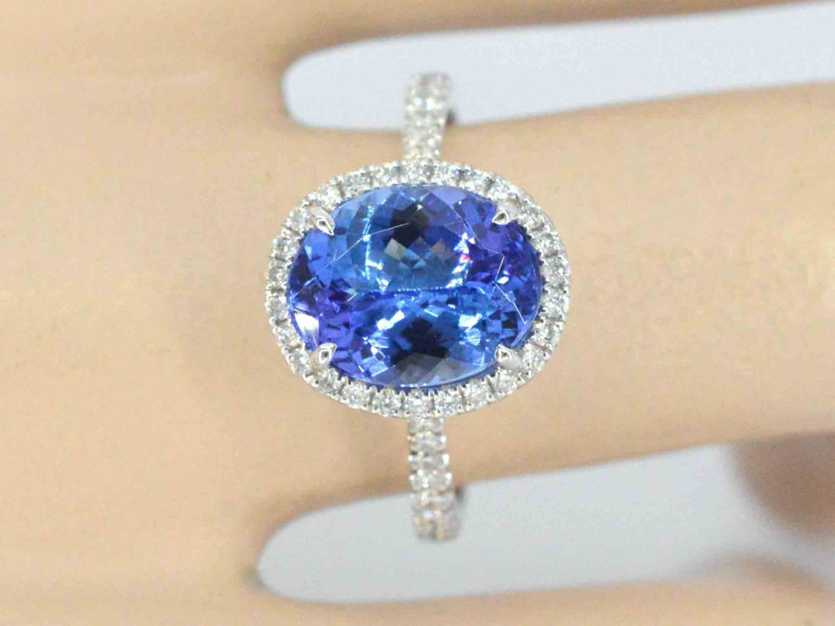 Gouden ring met diamant en tanzaniet