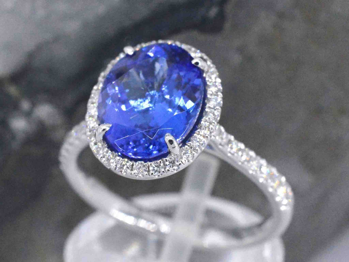 Gouden ring met diamant en tanzaniet