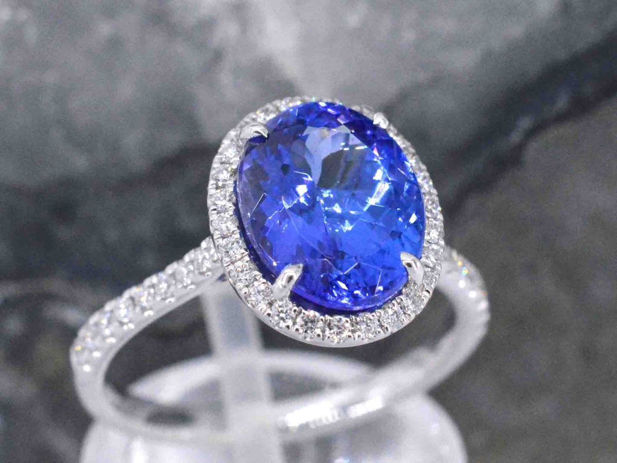 Gouden ring met diamant en tanzaniet