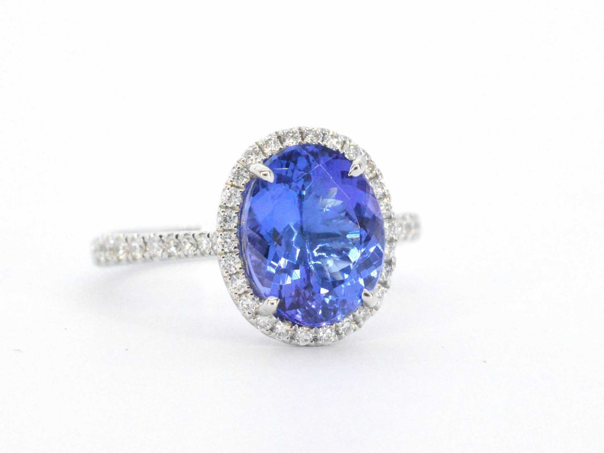 Gouden ring met diamant en tanzaniet