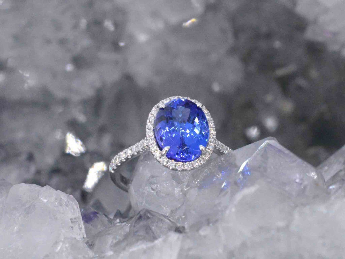 Gouden ring met diamant en tanzaniet
