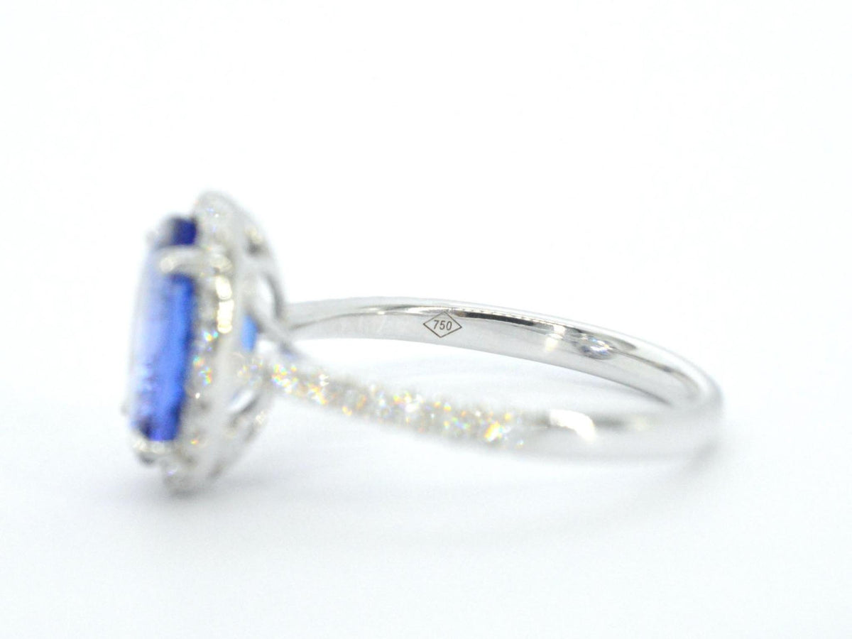 Gouden ring met diamant en tanzaniet