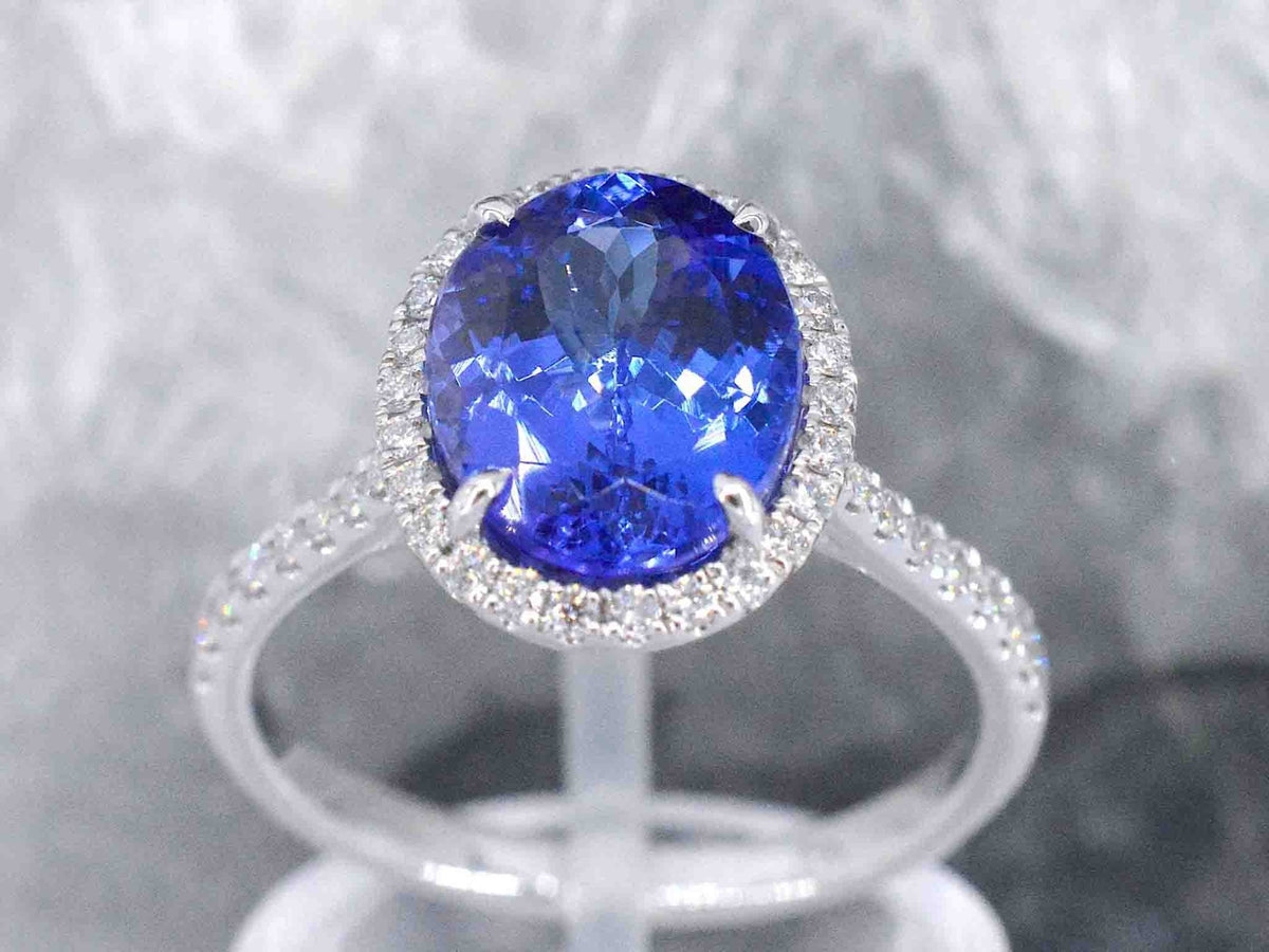 Gouden ring met diamant en tanzaniet
