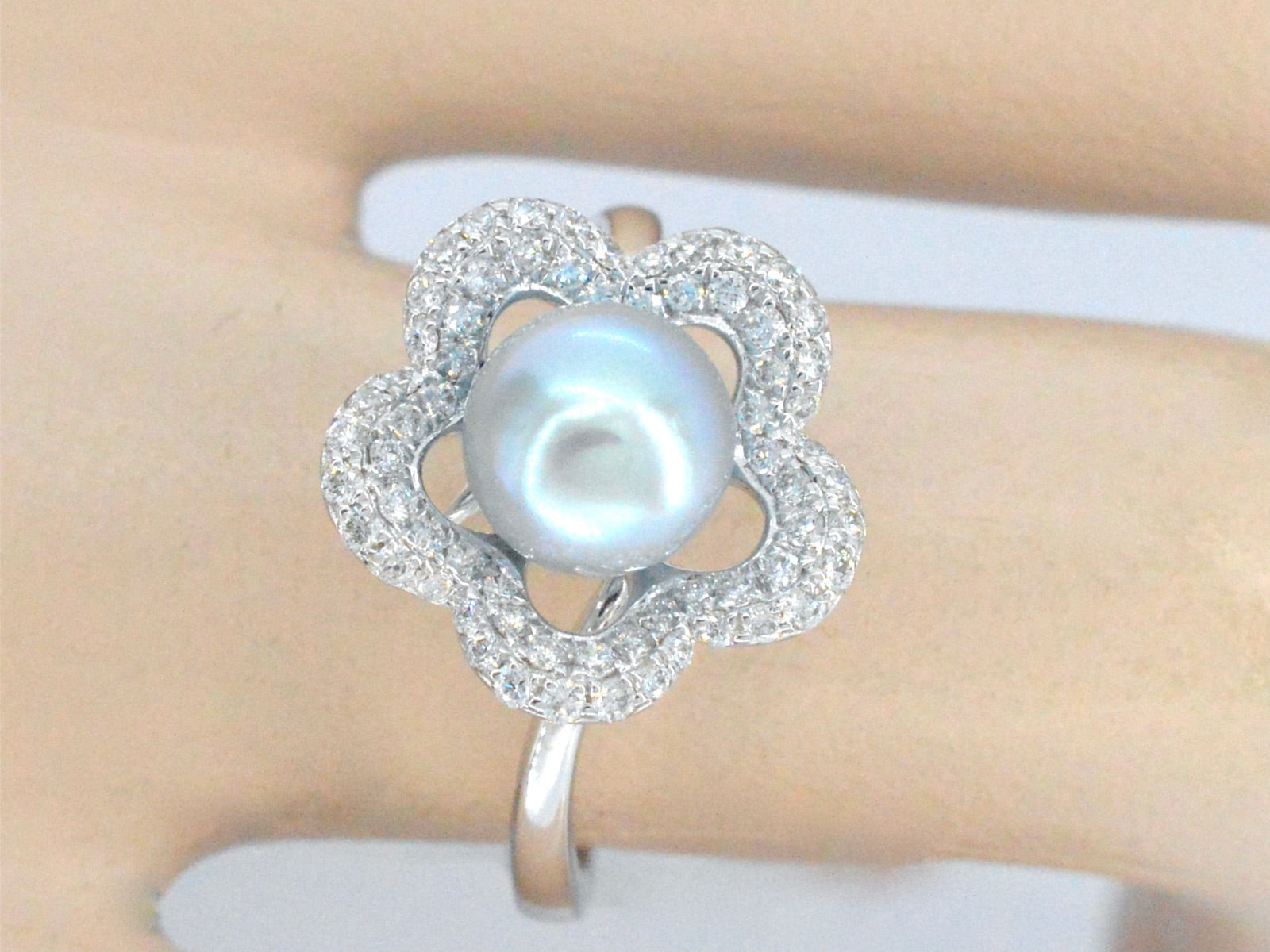 Gouden ring met diamant en parel