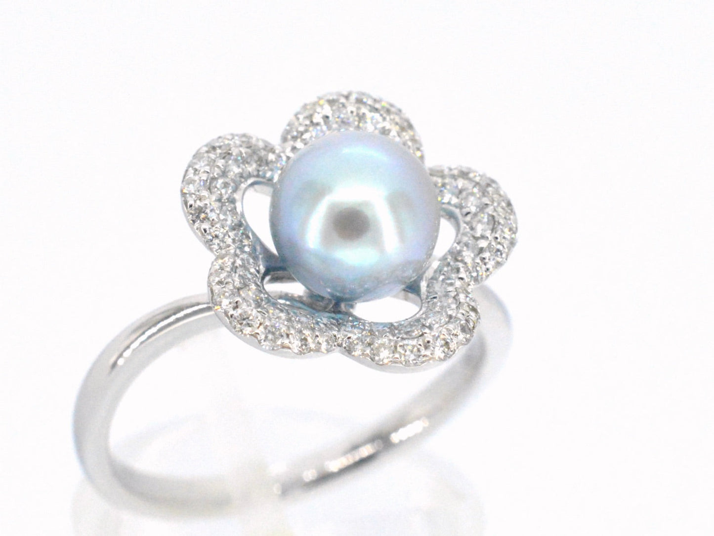 Gouden ring met diamant en parel 7191-2