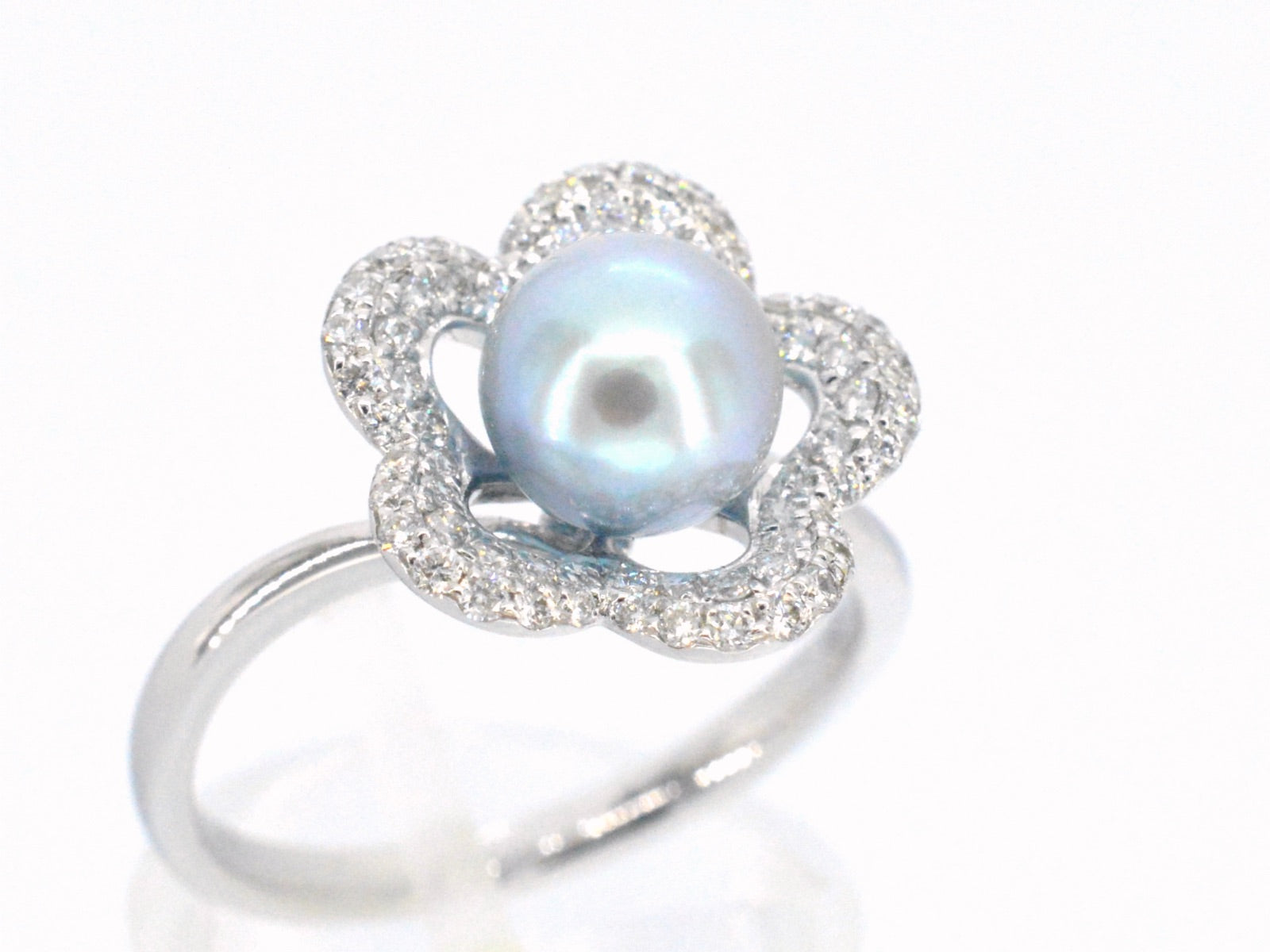 Gouden ring met diamant en parel 7191-2