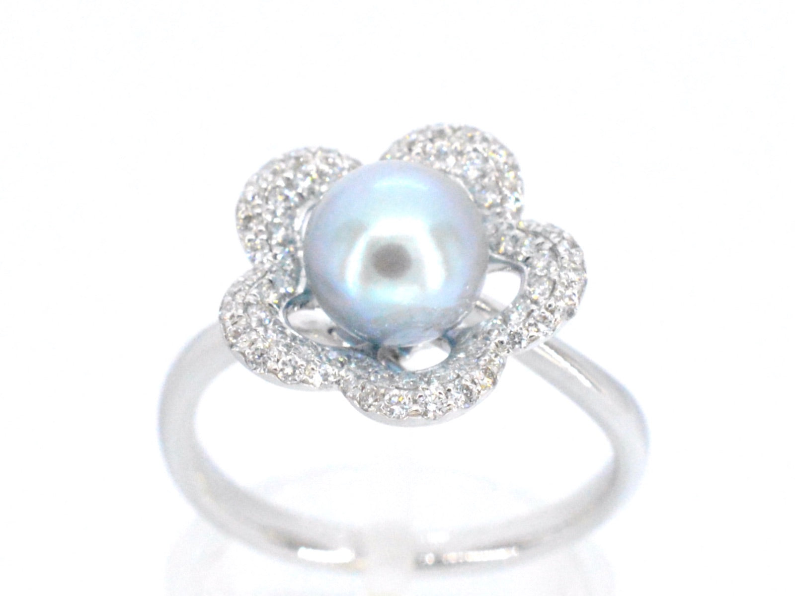 Gouden ring met diamant en parel 7191-8