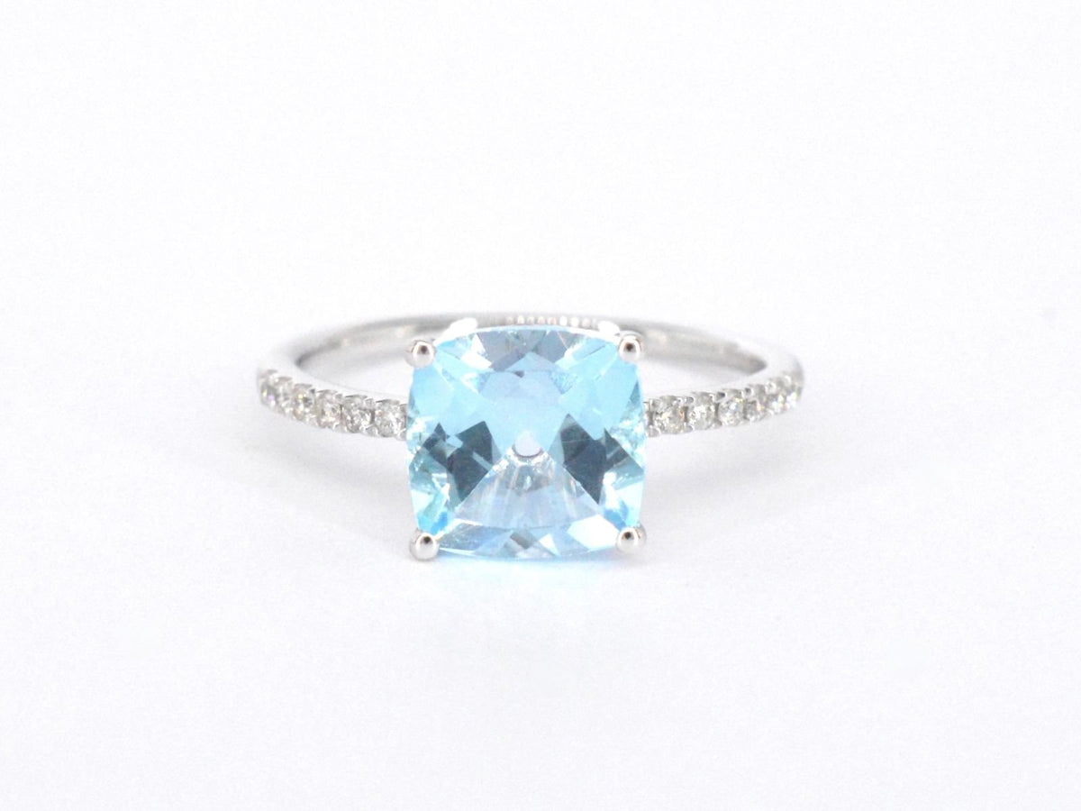 Witgouden ring met diamanten en topaas
