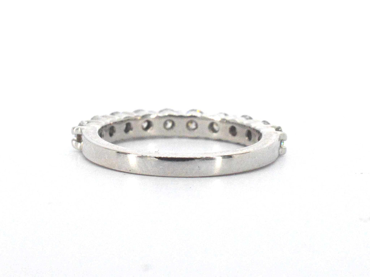 Gouden half-alliance ring van 18 karaat met 10 briljant geslepen natuurlijke diamanten